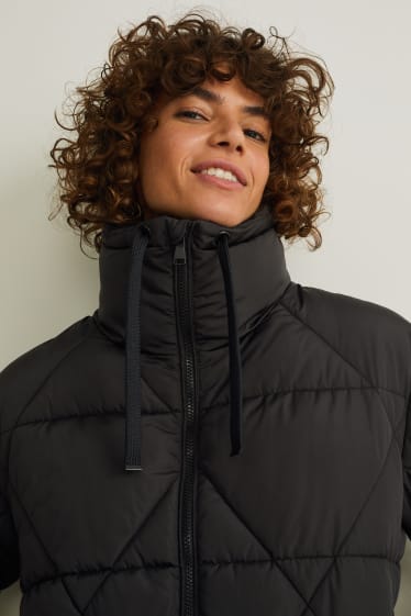 Women - Quilted gilet - black