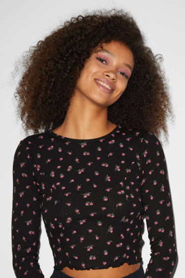 Dospívající a mladí - CLOCKHOUSE - krátké tričko s dlouhým rukávem - s květinovým vzorem - černá
