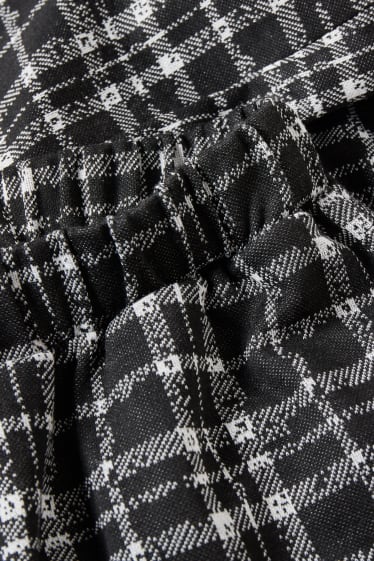 Ados & jeunes adultes - CLOCKHOUSE - pantalon en tissu - mid waist - palazzo - à carreaux - noir / blanc