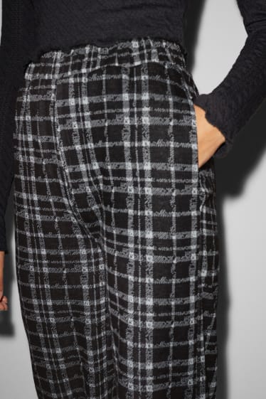 Femmes - CLOCKHOUSE - pantalon en tissu - mid waist - palazzo - à carreaux - noir / blanc