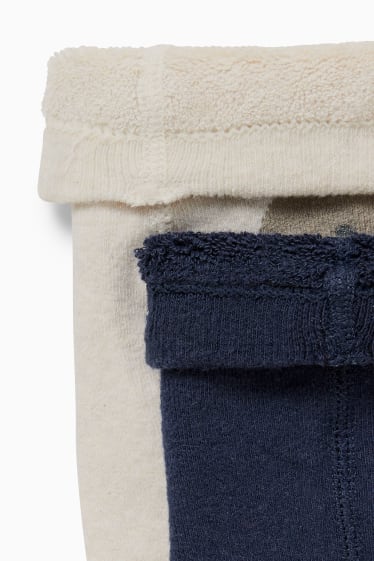 Baby: jongens - Set van 2 - antislipmaillots voor baby’s - donkerblauw / crème wit