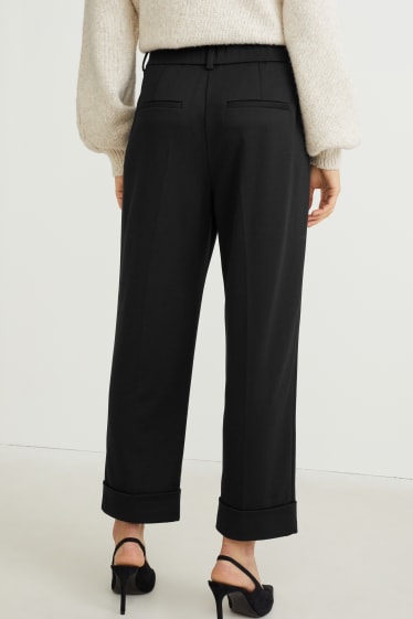 Donna - Pantaloni in jersey - tapered fit - nero