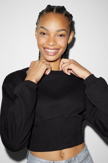 Dona - Dessuadora crop - negre