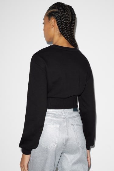 Dona - Dessuadora crop - negre