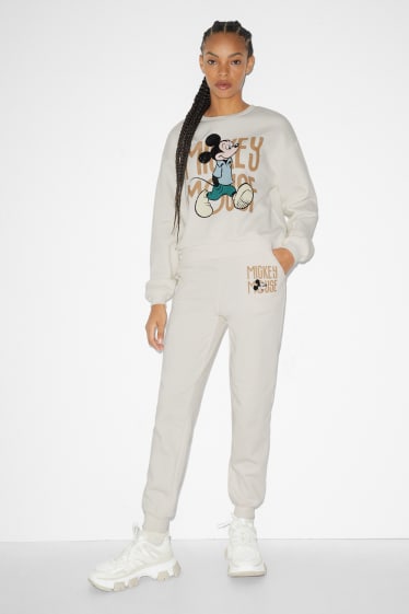 Dames - CLOCKHOUSE - joggingbroek - Mickey Mouse - crème wit