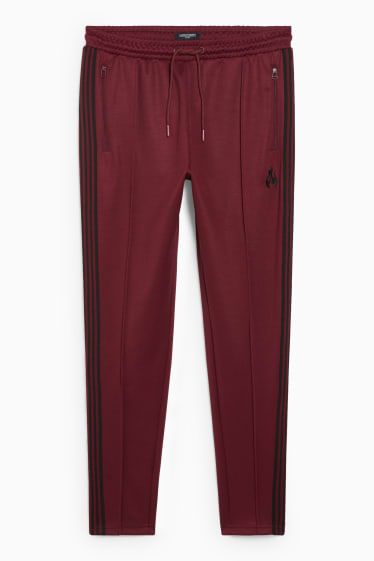 Hommes - CLOCKHOUSE - pantalon de jogging - rouge foncé