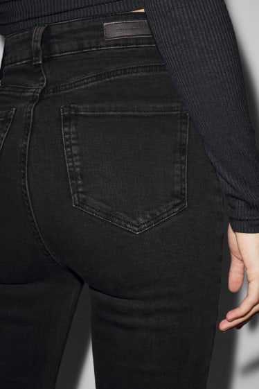 Femmes - CLOCKHOUSE - jean à jambe évasée - high waist - LYCRA® - noir