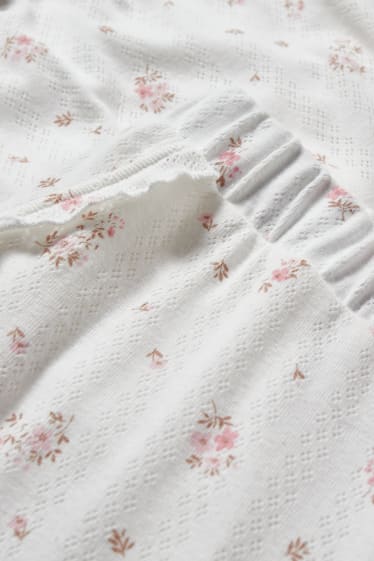 Nastolatki - CLOCKHOUSE - spodnie od piżamy - w kwiatki - biały