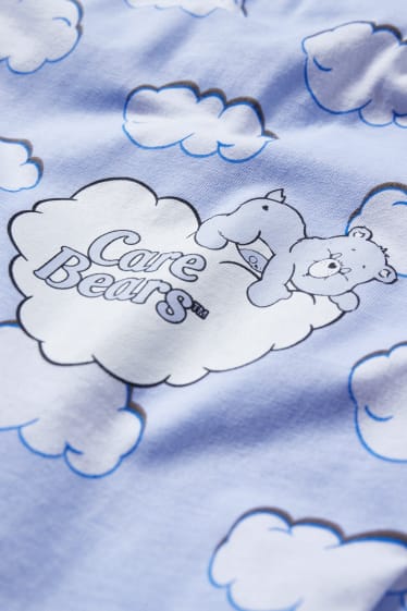 Dospívající a mladí - CLOCKHOUSE - pyžamové kalhoty - Care Bears - světle modrá