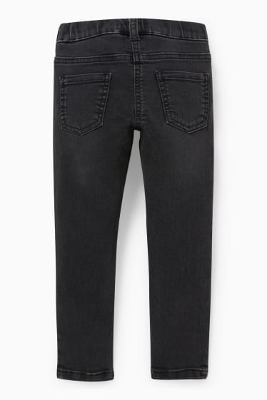 Kinderen - Jegging jeans - glanseffect - zwart