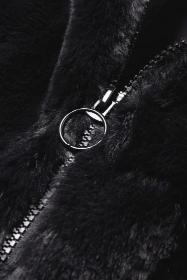 Femmes - CLOCKHOUSE - veste en imitation fourrure avec capuche - noir