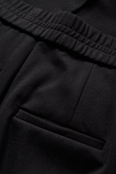 Donna - Pantaloni di jersey - tapered fit - nero