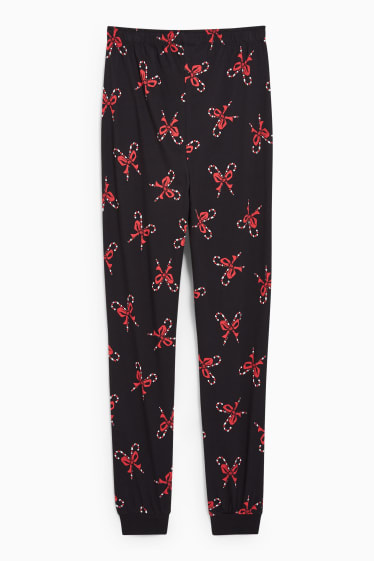 Dames - CLOCKHOUSE - pyjamabroek voor de kerst - de Grinch - zwart