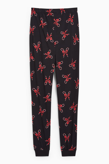 Femmes - CLOCKHOUSE - pantalon de Noël - Le Grinch - noir