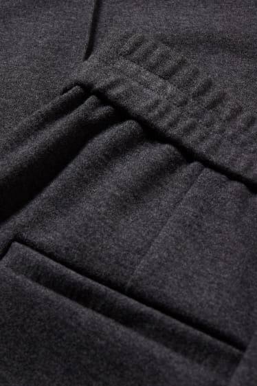 Dona - Pantalons de tela - cintura mitjana - tapered fit - gris fosc jaspiat