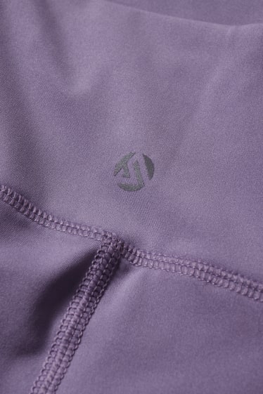 Dona - Leggings capri tècnics - Supportive - ioga - violeta clar