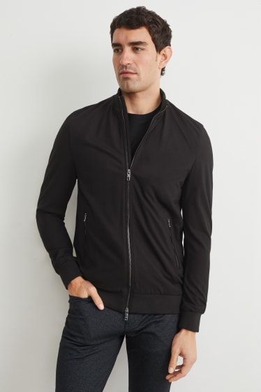 Hombre - Sudadera con cremallera - Flex - LYCRA® - negro