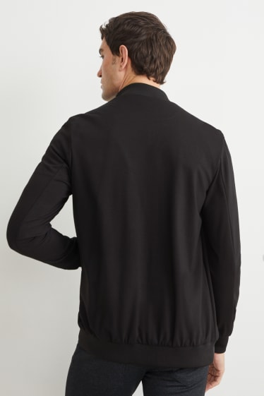 Hombre - Sudadera con cremallera - Flex - LYCRA® - negro