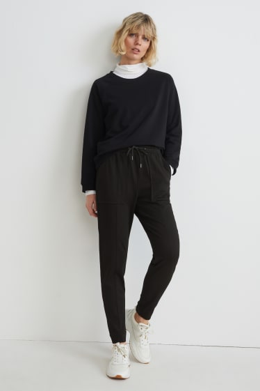 Dames - Pantalon - mid waist - tapered fit - zwart