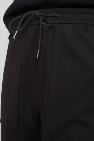 Dames - Pantalon - mid waist - tapered fit - zwart