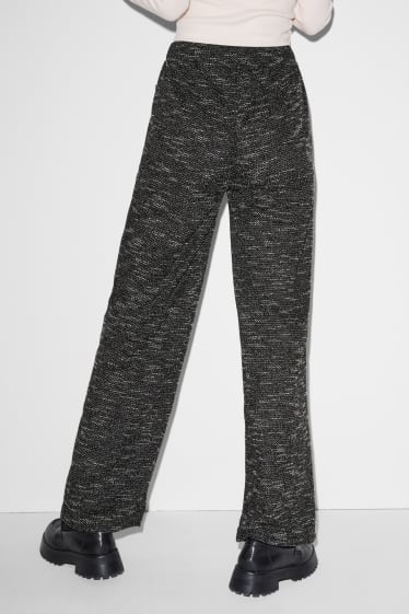 Dames - CLOCKHOUSE - jersey broek - loose fit - zwart mix