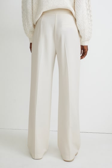 Kobiety - Spodnie materiałowe - wysoki stan - szerokie nogawki - biały