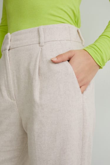 Kobiety - Spodnie materiałowe - wysoki stan - szerokie nogawki - beżowy