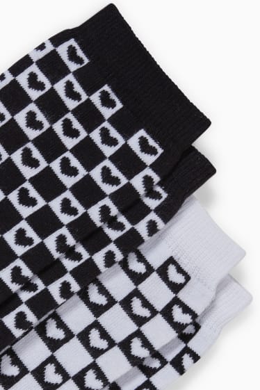 Dames - CLOCKHOUSE - set van 2 paar - sokken - hartjes - zwart / wit
