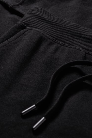 Dámské - Teplákové kalhoty basic - černá