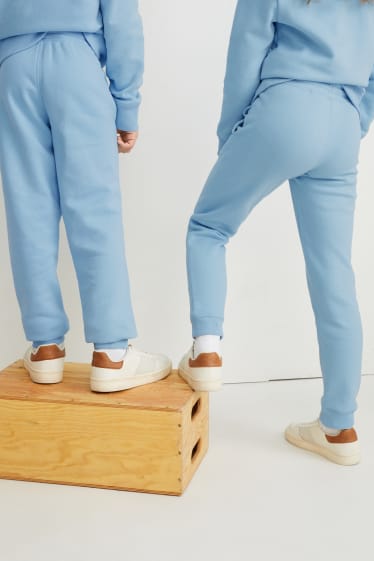 Dětské - Teplákové kalhoty - genderově neutrální  - světle modrá