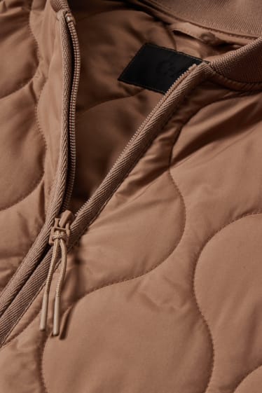Women - Quilted coat - brown