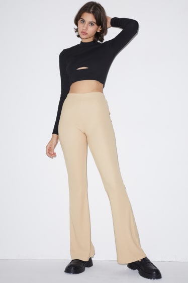 Femmes - CLOCKHOUSE - pantalon en jersey - flared - beige