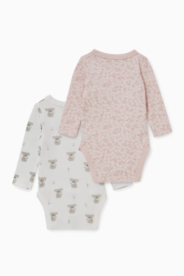 Babys - Set van 2 - wikkelrompertje - wit / roze