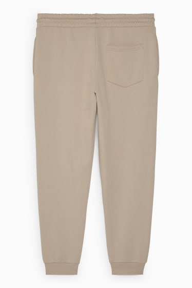 Uomo - Pantaloni sportivi - beige