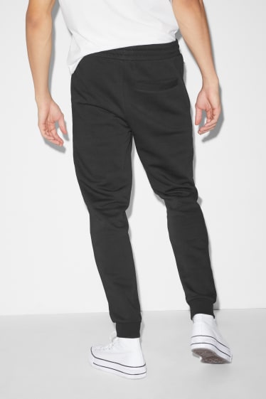 Hommes - Pantalon de jogging - noir