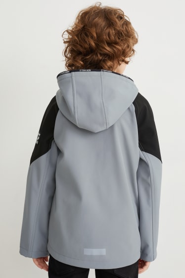 Niños - Chaqueta softshell con capucha - gris / negro