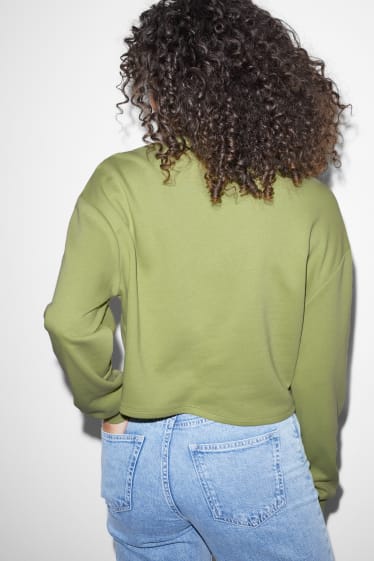 Femei - CLOCKHOUSE - bluză crop de molton - SmileyWorld® - verde deschis