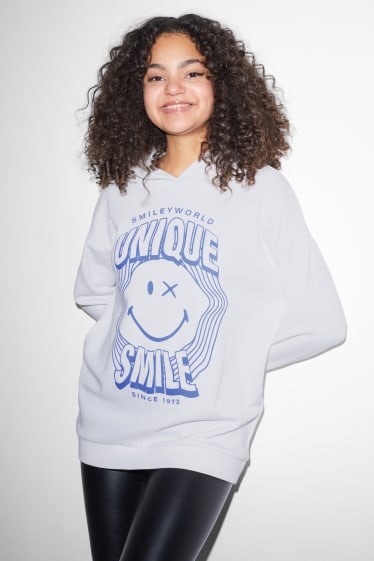 Ados & jeunes adultes - CLOCKHOUSE - sweat à capuche - SmileyWorld® - blanc