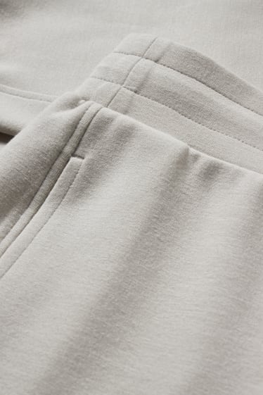 Dámské - Teplákové kalhoty basic - krémové barvy