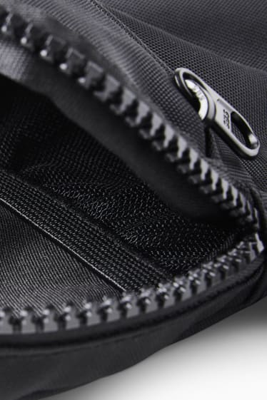 Unisex - Small sports bag with shoulder strap - black
