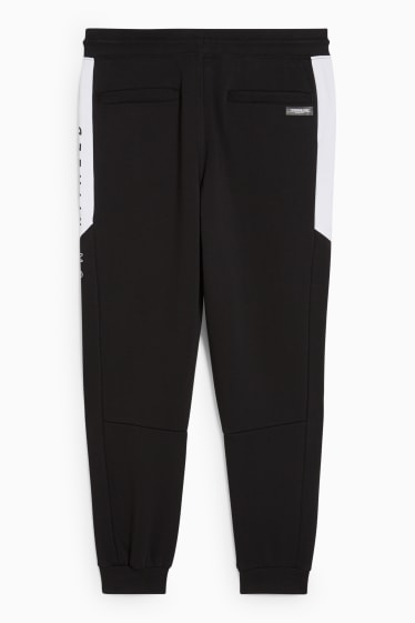 Uomo - Pantaloni sportivi - nero