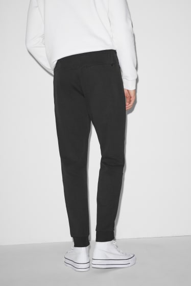 Hommes - Pantalon de jogging - noir