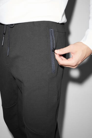 Hommes - Pantalon de jogging - noir