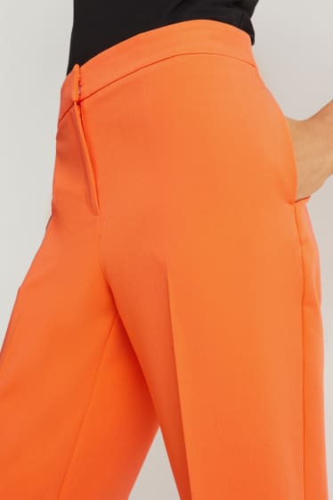 Kobiety - Spodnie materiałowe - średni stan - regular fit - pomarańczowy
