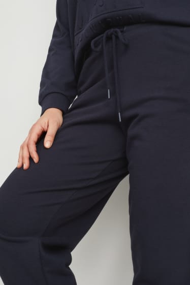 Dámské - Teplákové kalhoty - tmavomodrá