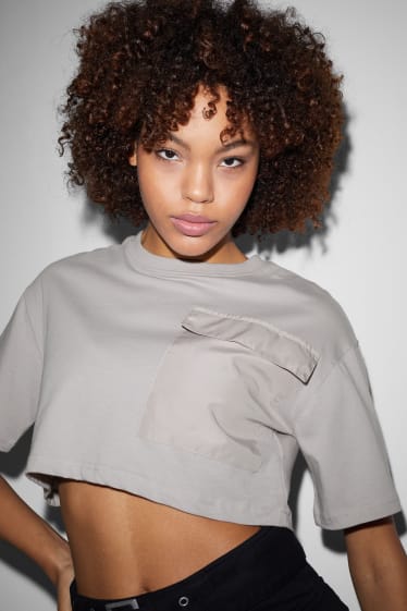Dona - Samarreta crop - gris clar jaspiat