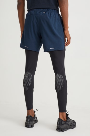 Home - Pantalons curts tècnics - blau fosc