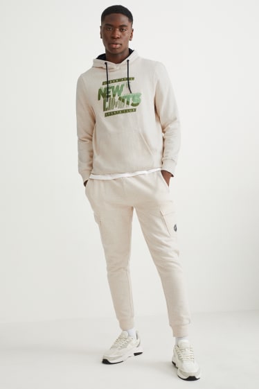 Hommes - Pantalon de jogging - beige chiné