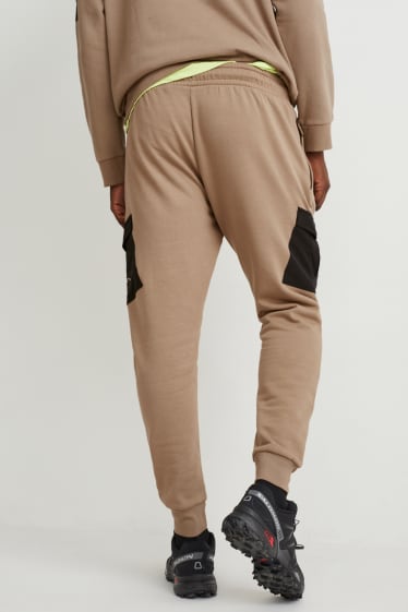 Hommes - Pantalon de jogging - gris-marron