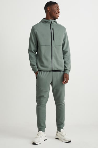 Uomo - Pantaloni sportiv - verde